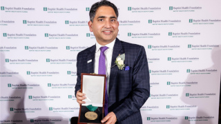 Dr Ahluwalia with award